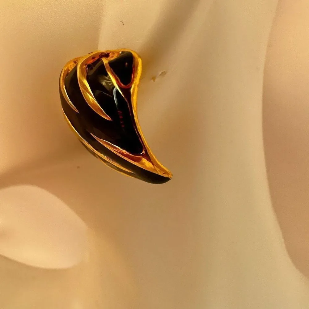 Gold tone and black square post earrings